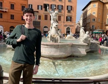 student with fountain abroad rome italy