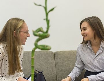 two female interns abroad with ciee