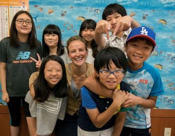Teach in South Korea teacher with her students
