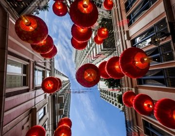 singapore lanterns in street from below