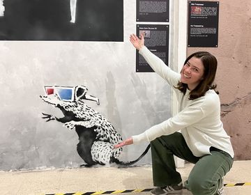 banksy museum abroad student posing