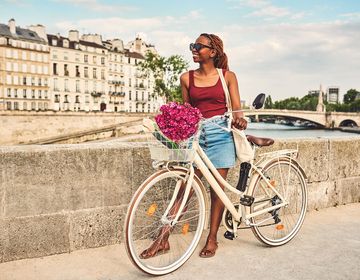 girl biking abroad paris france