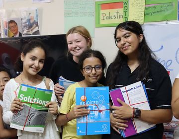 Student volunteering with organization while studying abroad