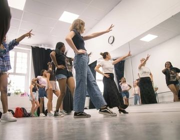 Students dancing in class in Seville