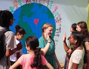 Students high five in Mohammedia