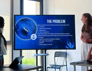 nice-hssa-two-female-students-presenting-final-project