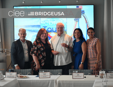 CIEE and BridgeUSA representatives pose with an award recipient during a BridgeUSA Celebration Tour even