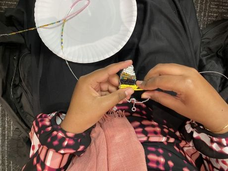 Student in a beading workshop