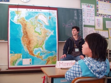 Gap year student volunteering in Tokyo classroom