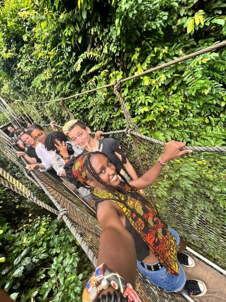 High school students group selfie on hanging bridge in Legon