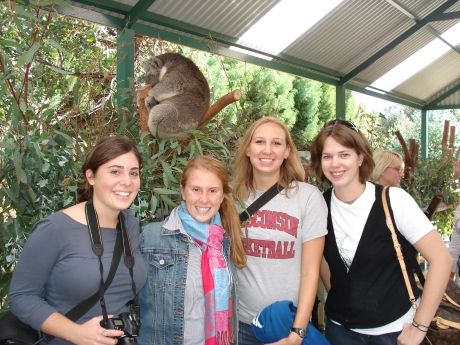 Students posing in koala sanctuary in Australia
