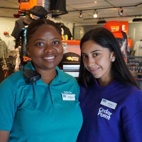 students working at amusement park