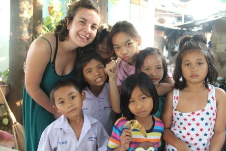 Teacher and students posing for a photo