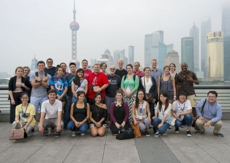 CIEE Teach in China group photo in front of Shanghai skyline on a foggy day