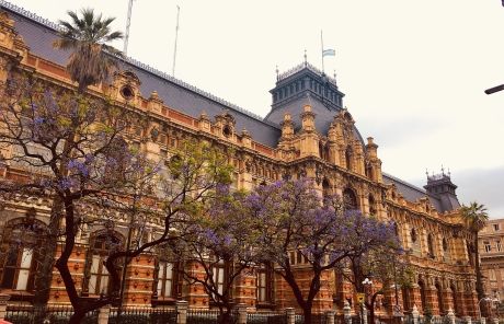 government building in buenos aires flowers flag