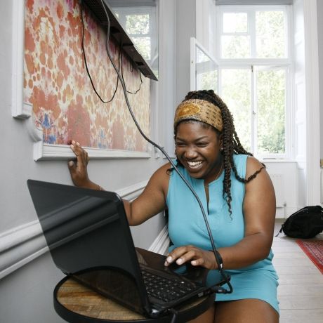 frederick douglass scholar laptop presentation smile