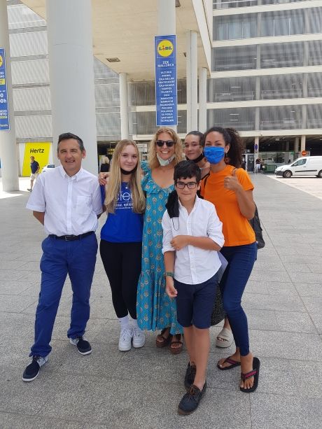 High school student with homestay family at the airport