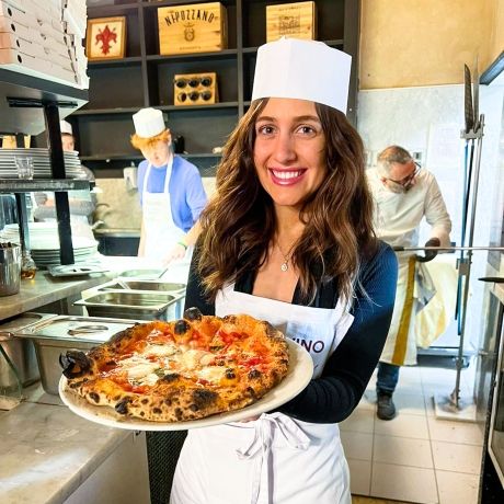 Florence girl showing off pizza she made