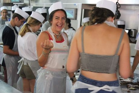 High school students taking cooking class in Barcelona