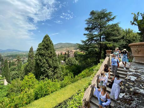 Rome students on steps in the hills