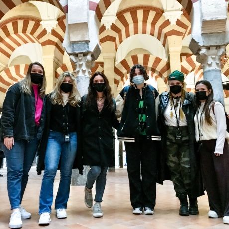 Seville students under arches