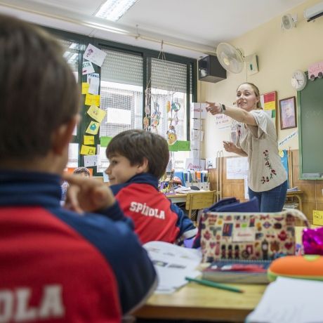 Seville student teacher in a classroom with kids