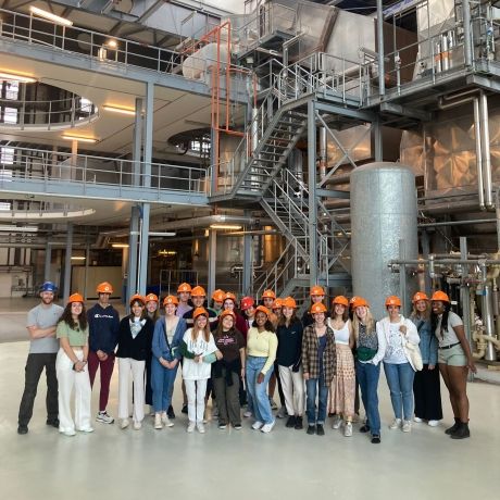 copenhagen group of student wearing hard hats at factory