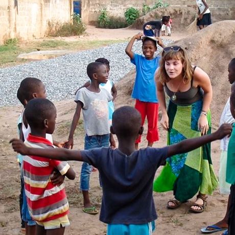 legon student playing with kids