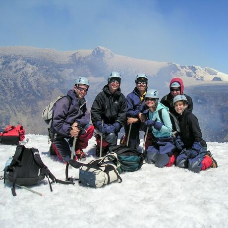 santiago ch hikers on a snowy mountain top