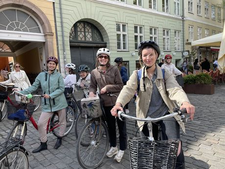 students bike riding in Copenhagen
