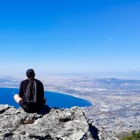 cape town student on table mountain overlooking city