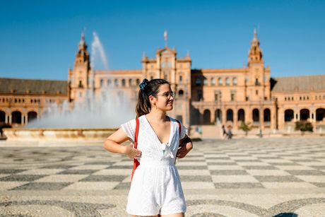 seville student walking plaza espana