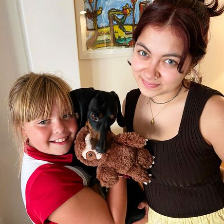 buenos aires student with her host sister and host puppy