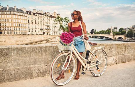 girl biking abroad paris france