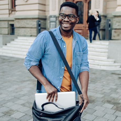 sao-paulo-student-carrying-laptop