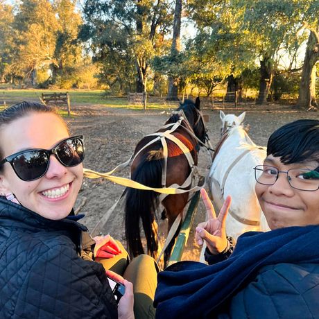 buenos-aires-two-students-smiling-horse-drawn-carriage