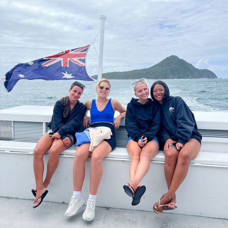 sydney-four-girls-boat-flag-island