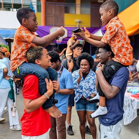 legon-hssa-students-carrying-kids-shoulders
