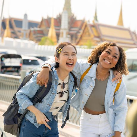 Female students near temple in Bangkok, Thailand