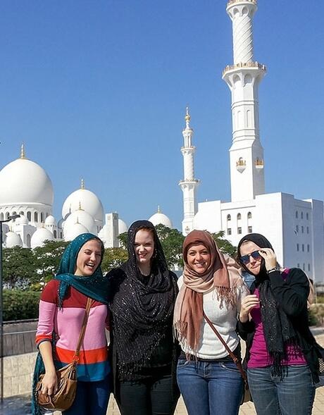 abu-dhabi-four-female-students-head-scarves-city-square