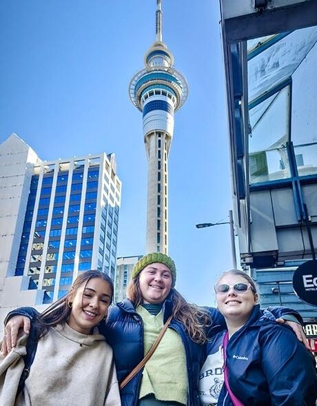 auckland-three-female-students-posing-sky-tower