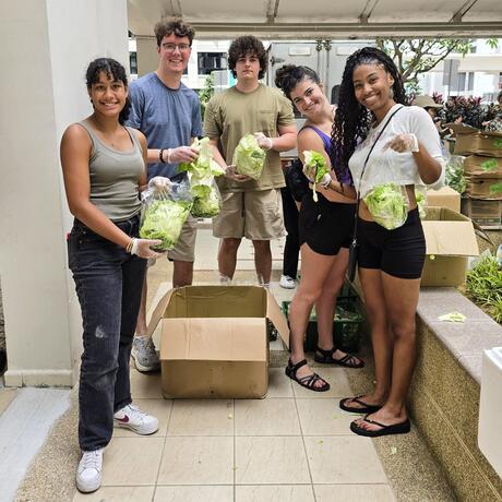 singapore-ccii-student-volunteers-holding-lettuce