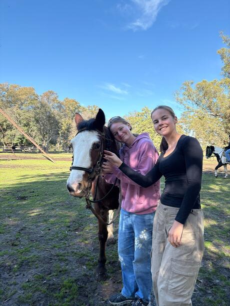 hssa-buenos-aires-students-at-la-estancia-with-horses.jpeg