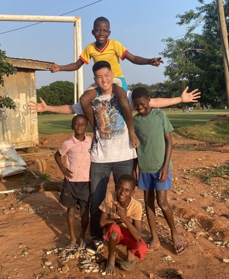 volunteer student in legon ghana with children