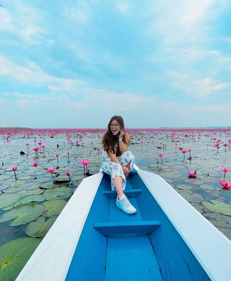 student on boat in Thailand.jpg