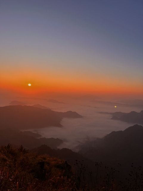Sunrise over a mountain at Phu Chi Fa