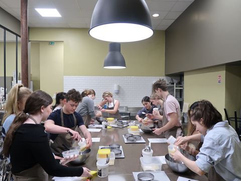 Students taking a pastry class on a high school semester abroad in France