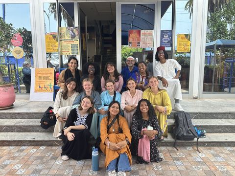 students posing with locals in Mohammedia