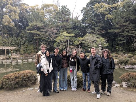 high school students posing in garden in Kyoto