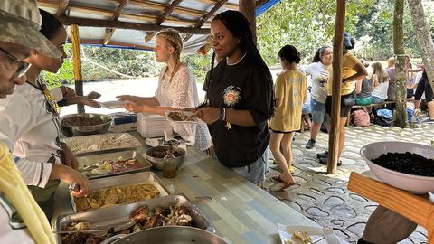 buffet while outside camping near a river in dominican republic